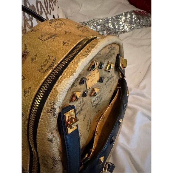 MCM Visetos Dual Stark Backpack convertible crossbody bag studded gold black main image 8